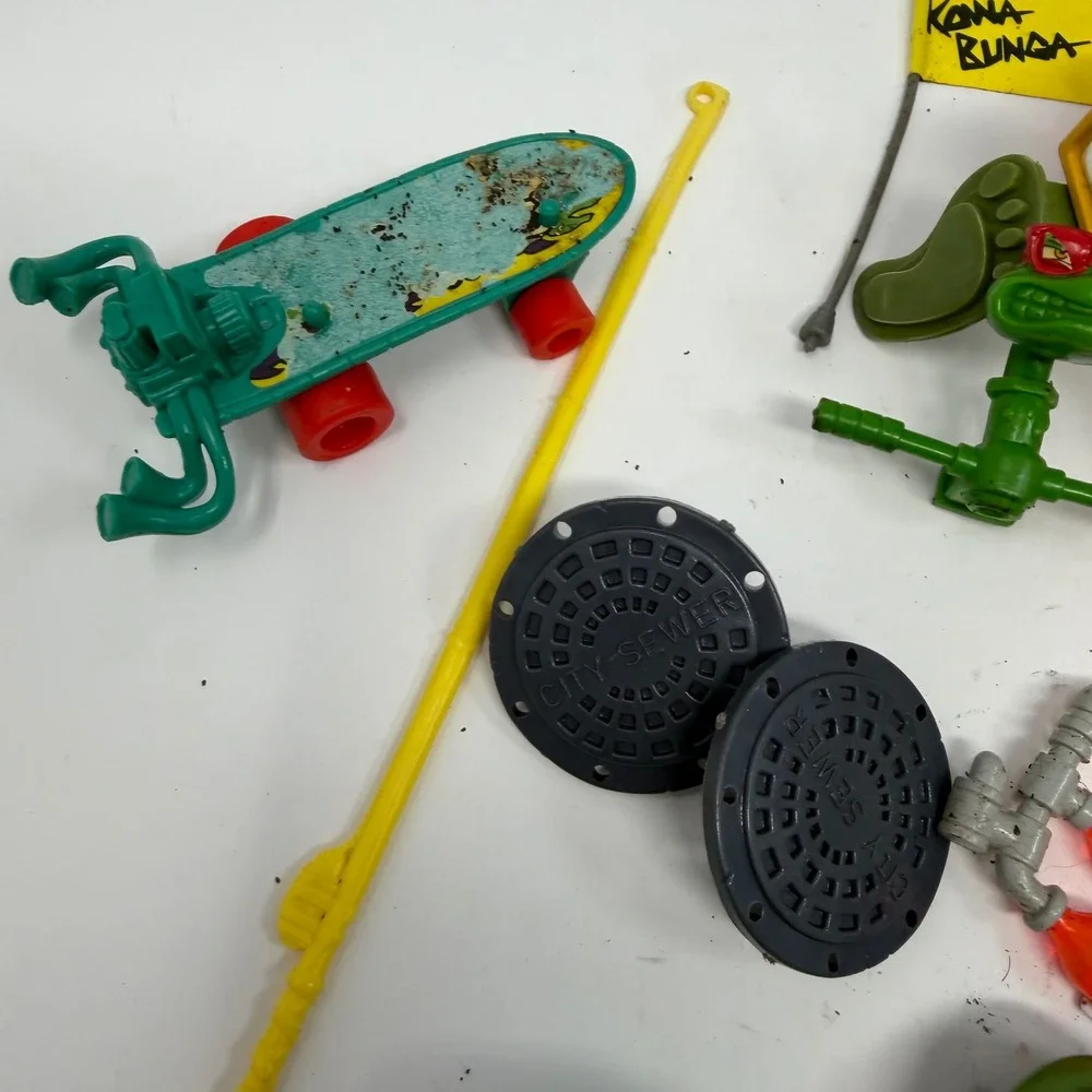 Vintage TMNT Accessories Lot Playmates Sewer Seltzer Skateboard Manhole Covers